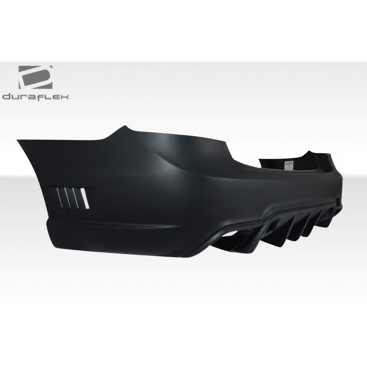 Modify your Mercedes-Benz E-Class 2010 with our Exterior/Rear Bumpers or Lips - Angled view showcasing the rear bumper design