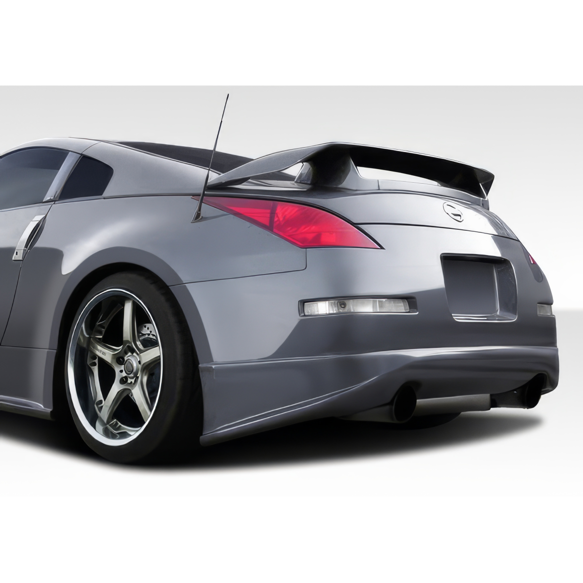 Modify your Nissan 350Z 2003 with our Exterior/Complete Body Kits - Rear angle view showing rear bumper and lip