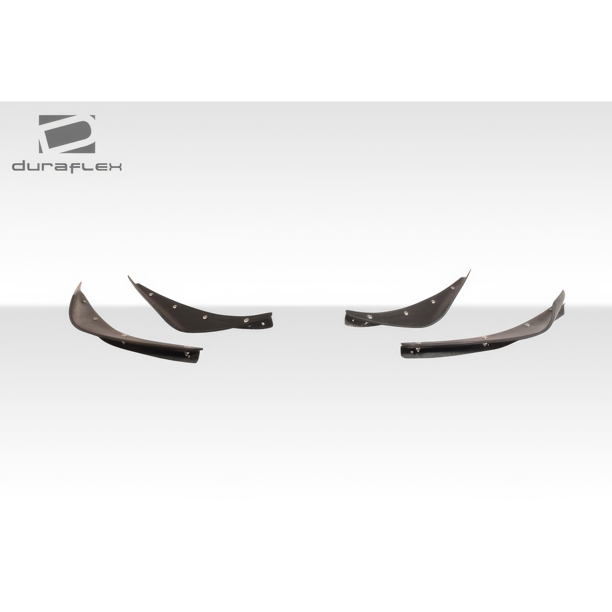 Modify your Subaru Impreza 2008 with our Exterior/Canards - Three quarter angle view of canards on a flat surface