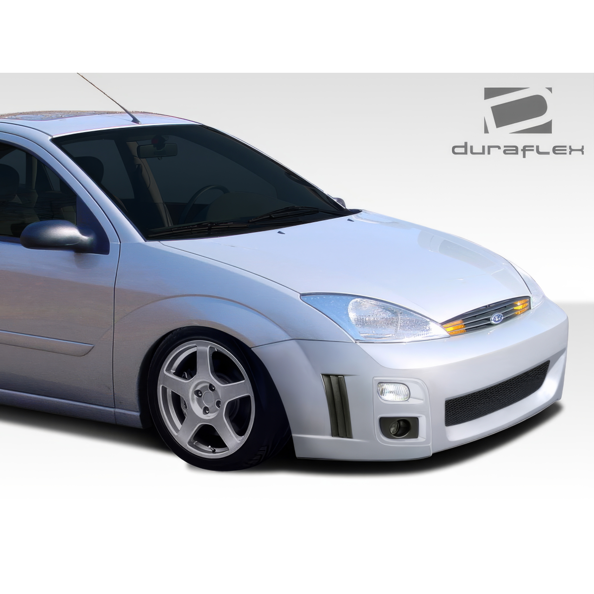 Modify your Ford Focus 2000 with our Exterior/Front Bumpers or Lips - The image shows a front angle view of the car