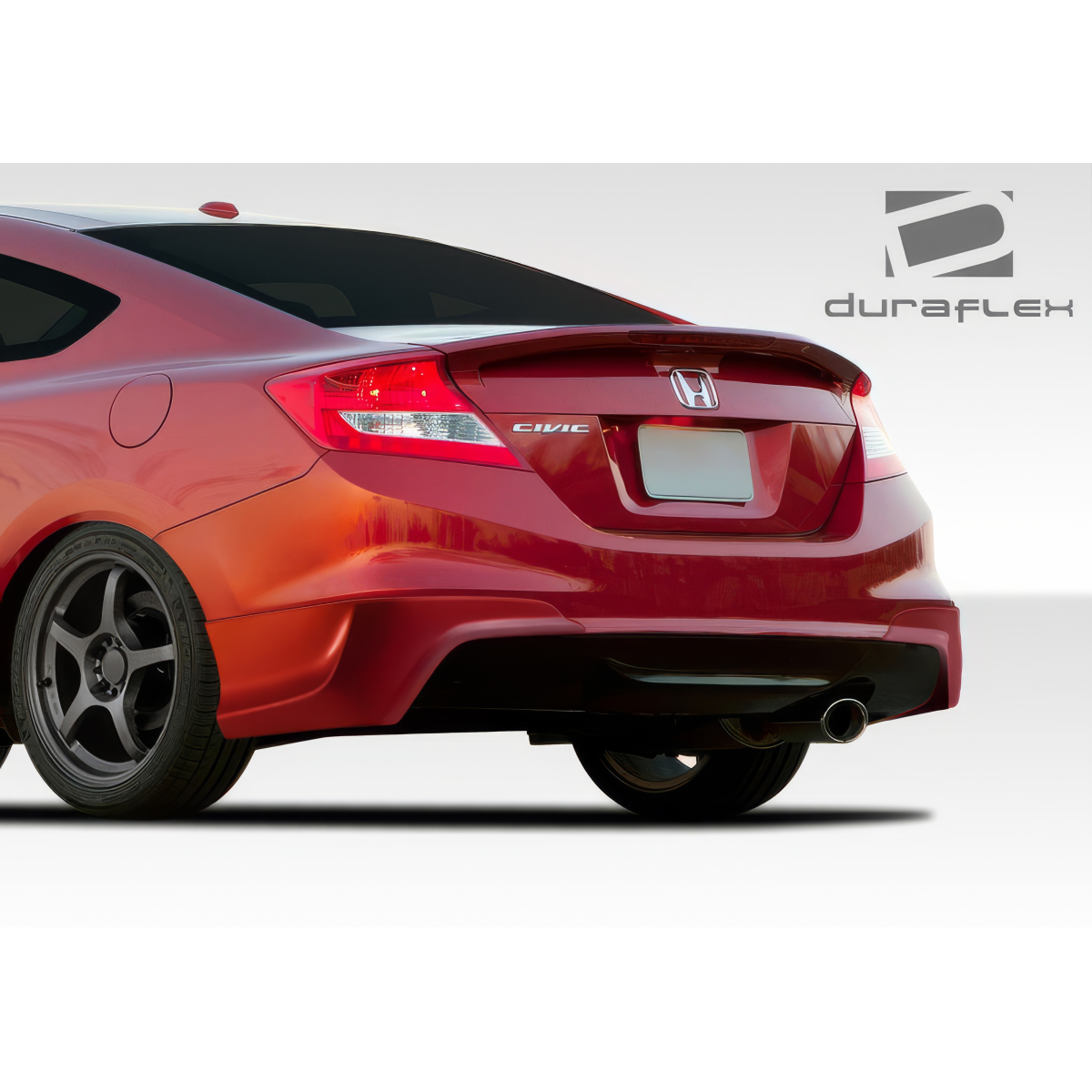 Modify your Honda Civic 2012 with our Exterior/Complete Body Kits - Rear angle view of the vehicle from the side