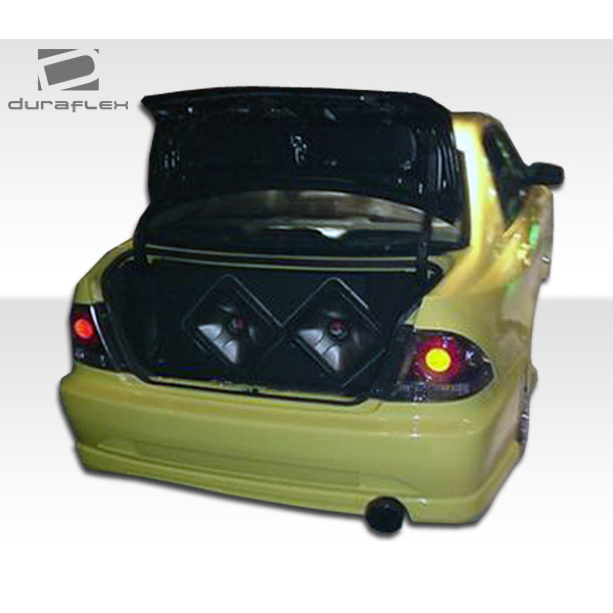 Modify your Lexus IS Series 2000 with our Exterior/Complete Body Kits - Rear angle view of car trunk and speakers