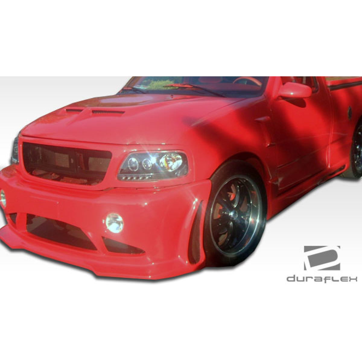 Modify your Ford F-150 1997 with our Exterior/Complete Body Kits - Front angle view of a modified vehicle