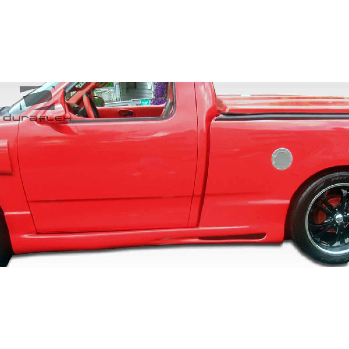 Modify your Ford F-150 1997 with our Exterior/Complete Body Kits - Side view of red truck at a straight angle