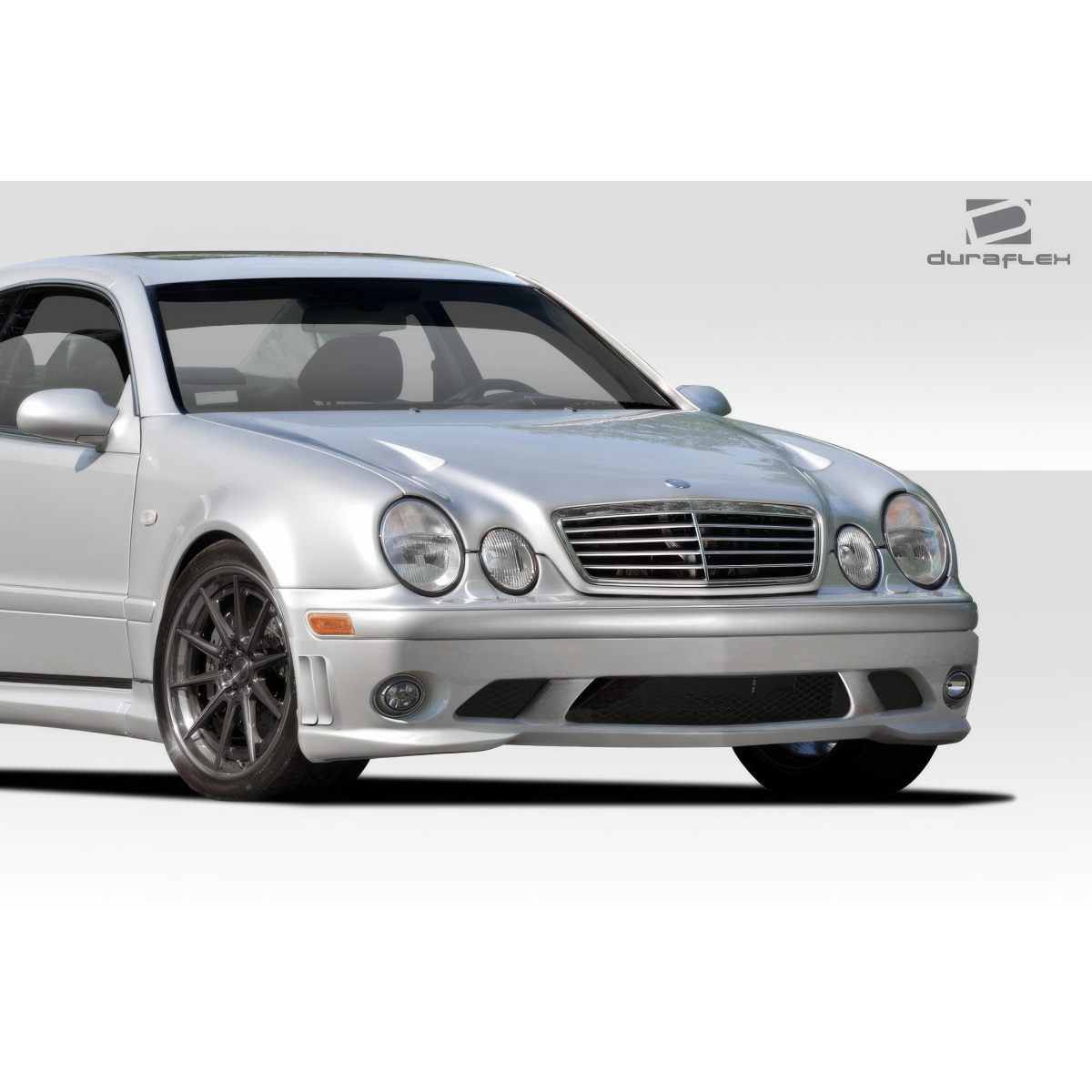 Modify your Mercedes-Benz C-Class 1998 with our Exterior/Front Bumpers or Lips - Front angle view of a silver Mercedes-Benz car