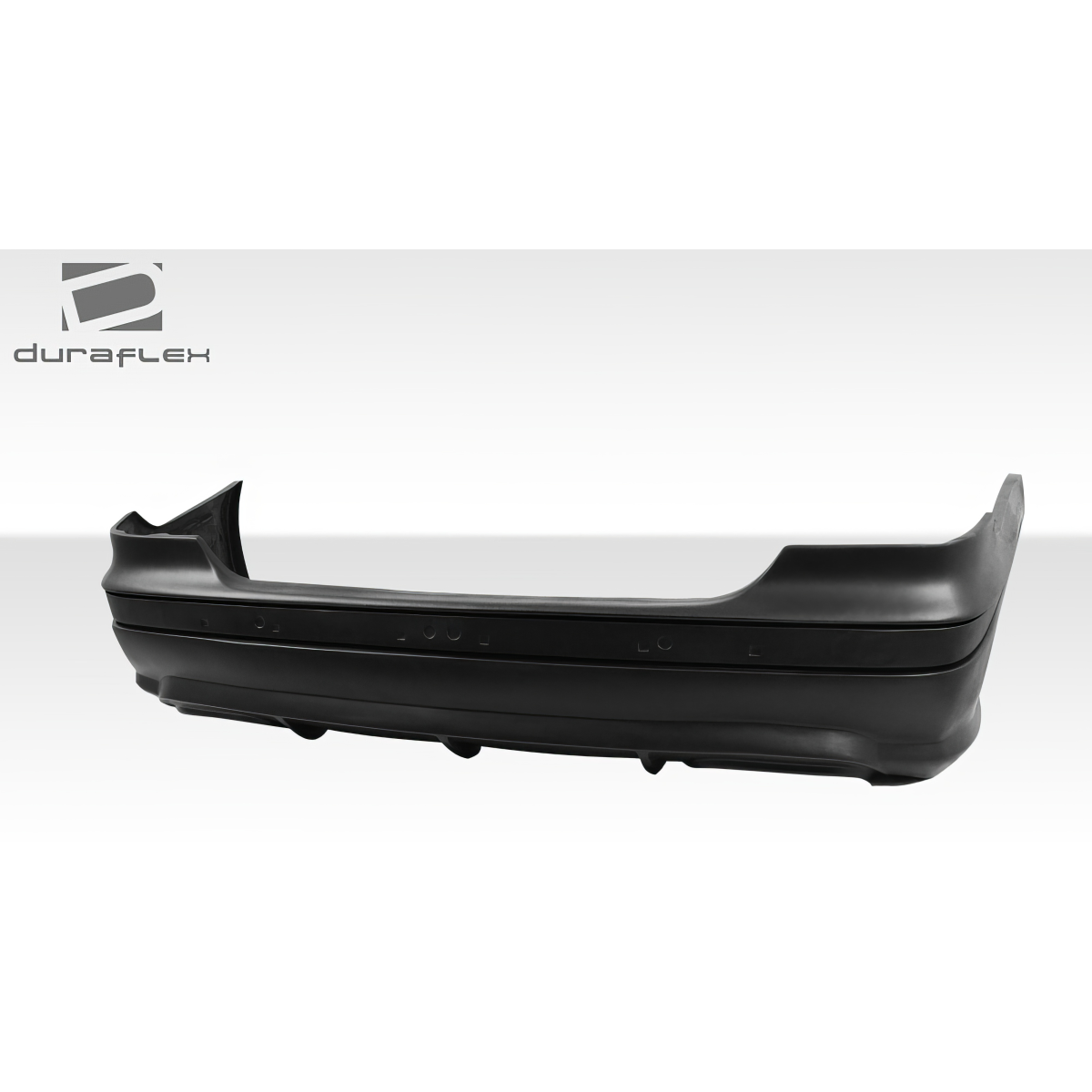 Modify your Mercedes-Benz C-Class 1998 with our Exterior/Rear Bumpers or Lips - Angled view of rear bumper part