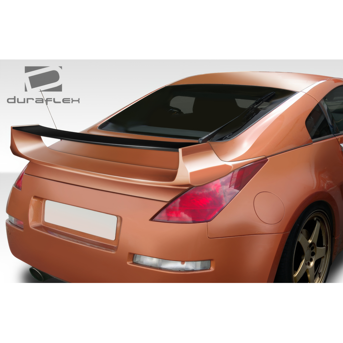 Modify your Nissan 350Z 2003 with our Exterior/Complete Body Kits - Rear view angle of a Nissan 350Z with wing