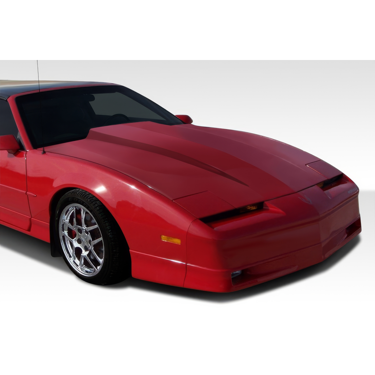 Modify your Pontiac Firebird 1982 with our Exterior/Hoods - Front angle view of red Pontiac Firebird hood