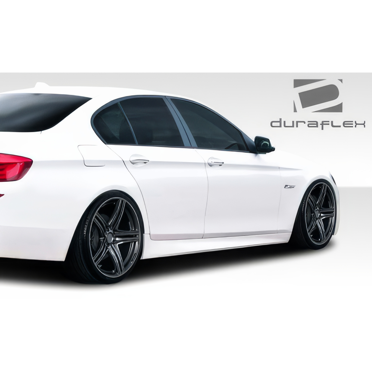 Modify your BMW 5-Series 2011 with our Exterior/Side Skirts - Side angle view of the vehicle