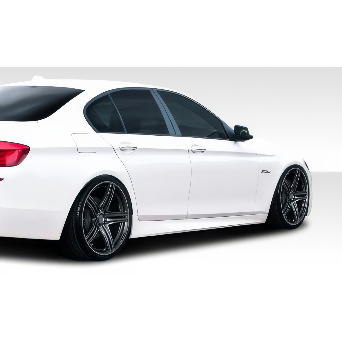 Modify your BMW 5-Series 2011 with our Exterior/Side Skirts - The image is viewed from a rear angle