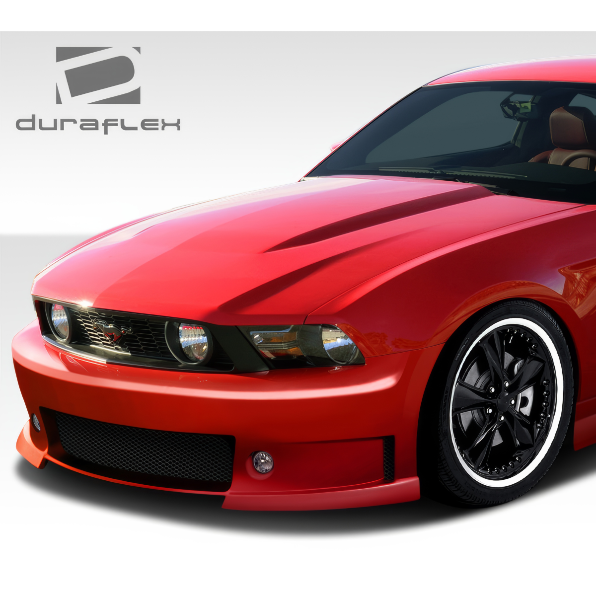 Modify your Ford Mustang 2010 with our Exterior/Front Bumpers or Lips - Front angle view of red Ford Mustang bumper