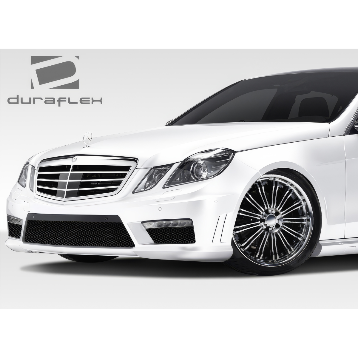 Modify your Mercedes-Benz E-Class 2010 with our Exterior/Front Bumpers or Lips - Frontal angle showcasing the front bumper design