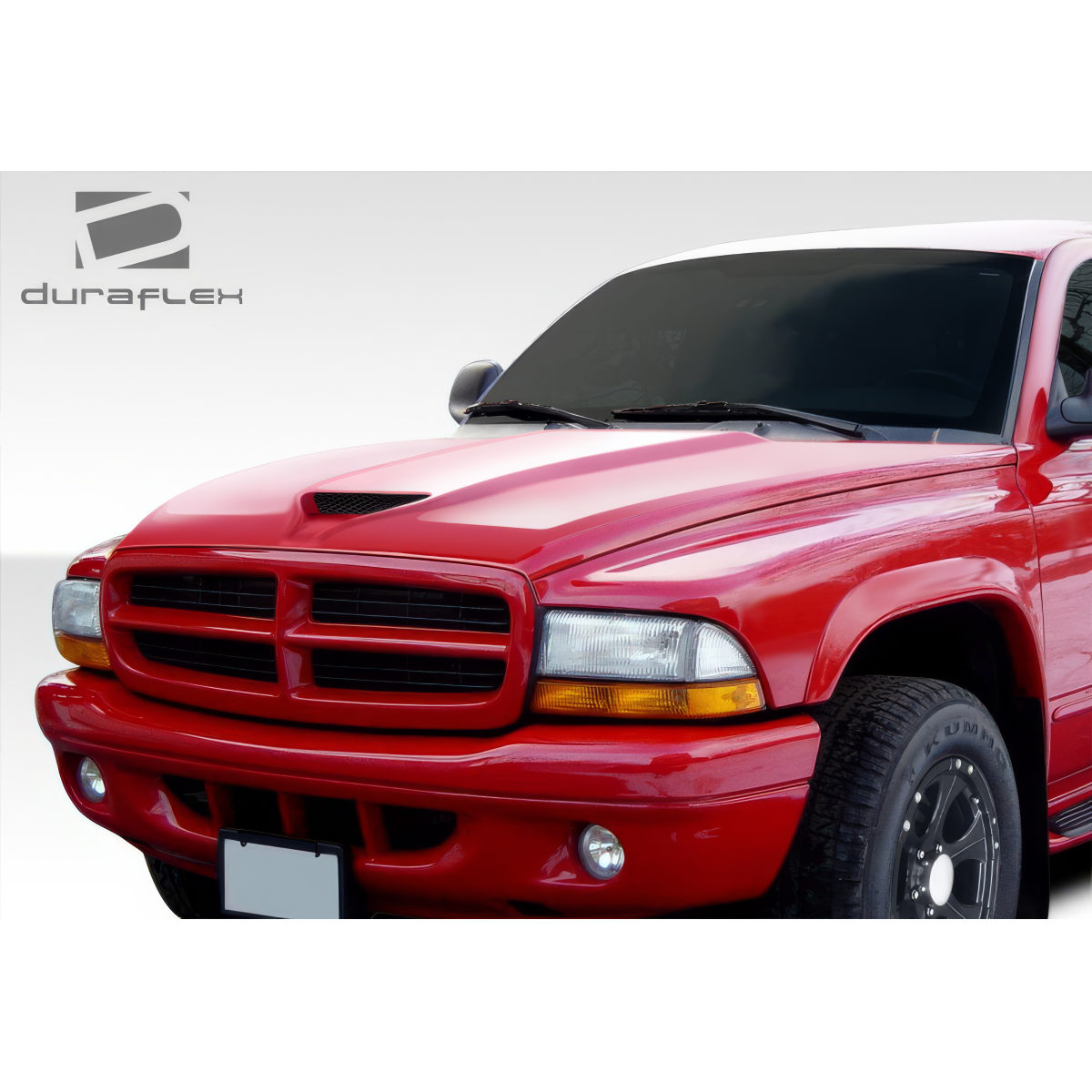 Modify your Dodge Dakota 1997 with our Exterior/Hoods - Front angle view of red Dodge Dakota hood