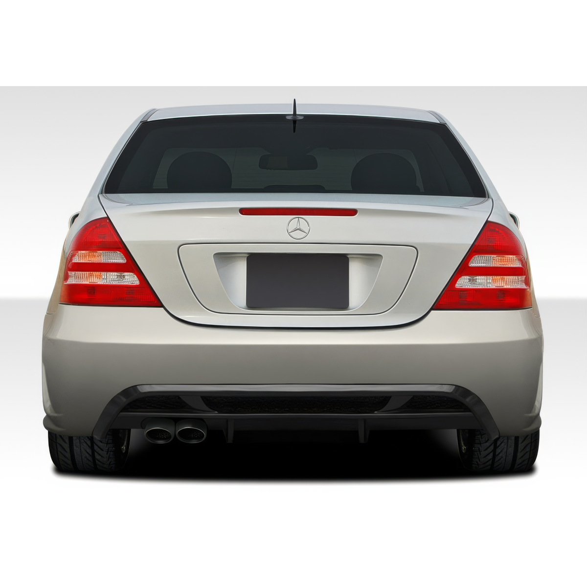 Modify your Mercedes-Benz C230 2001 with our Exterior/Rear Bumpers or Lips - Rear angle view of a silver Mercedes C230