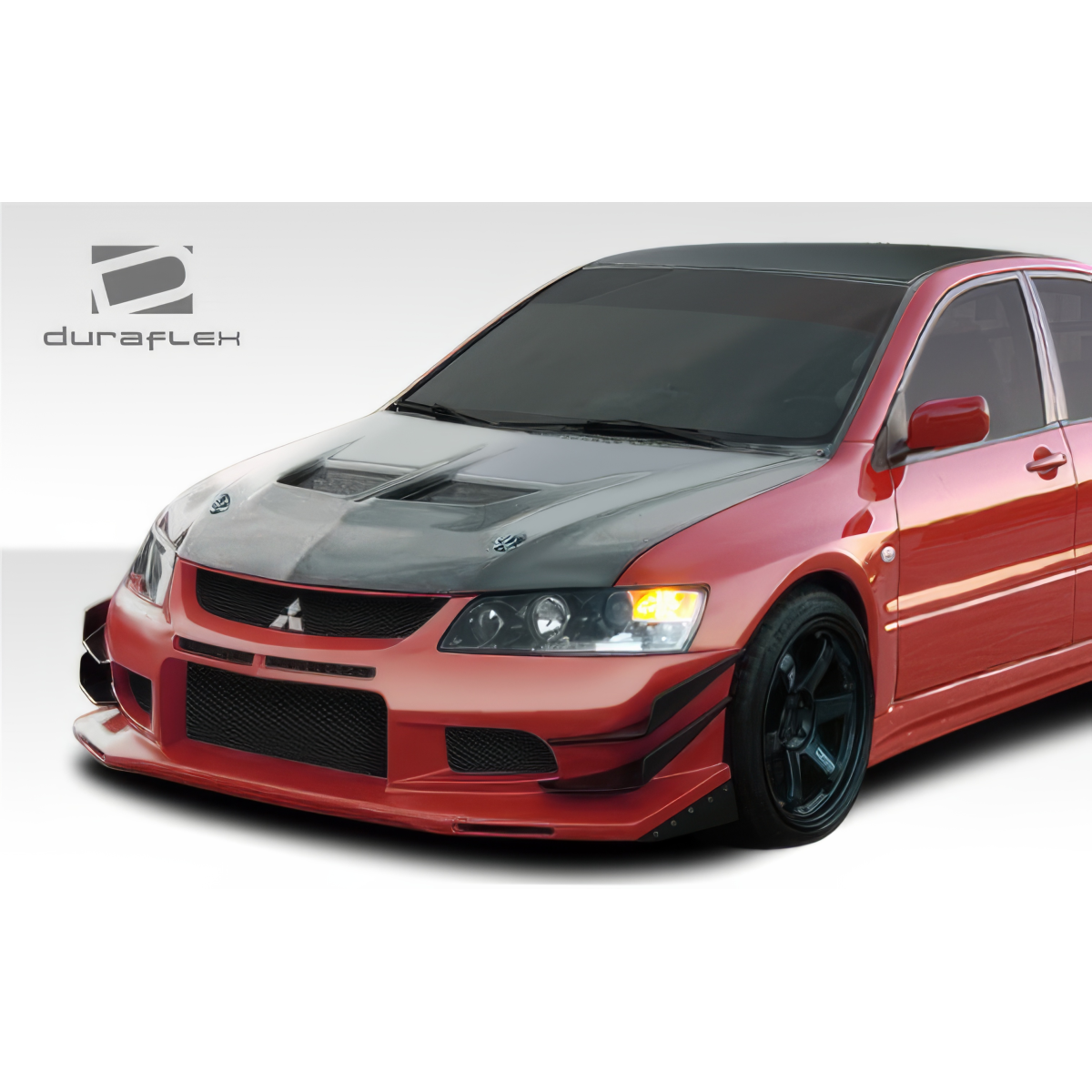 Modify your Mitsubishi Evolution 2003 with our Exterior/Front Bumpers or Lips - Front view at a slight angle showing the bumper