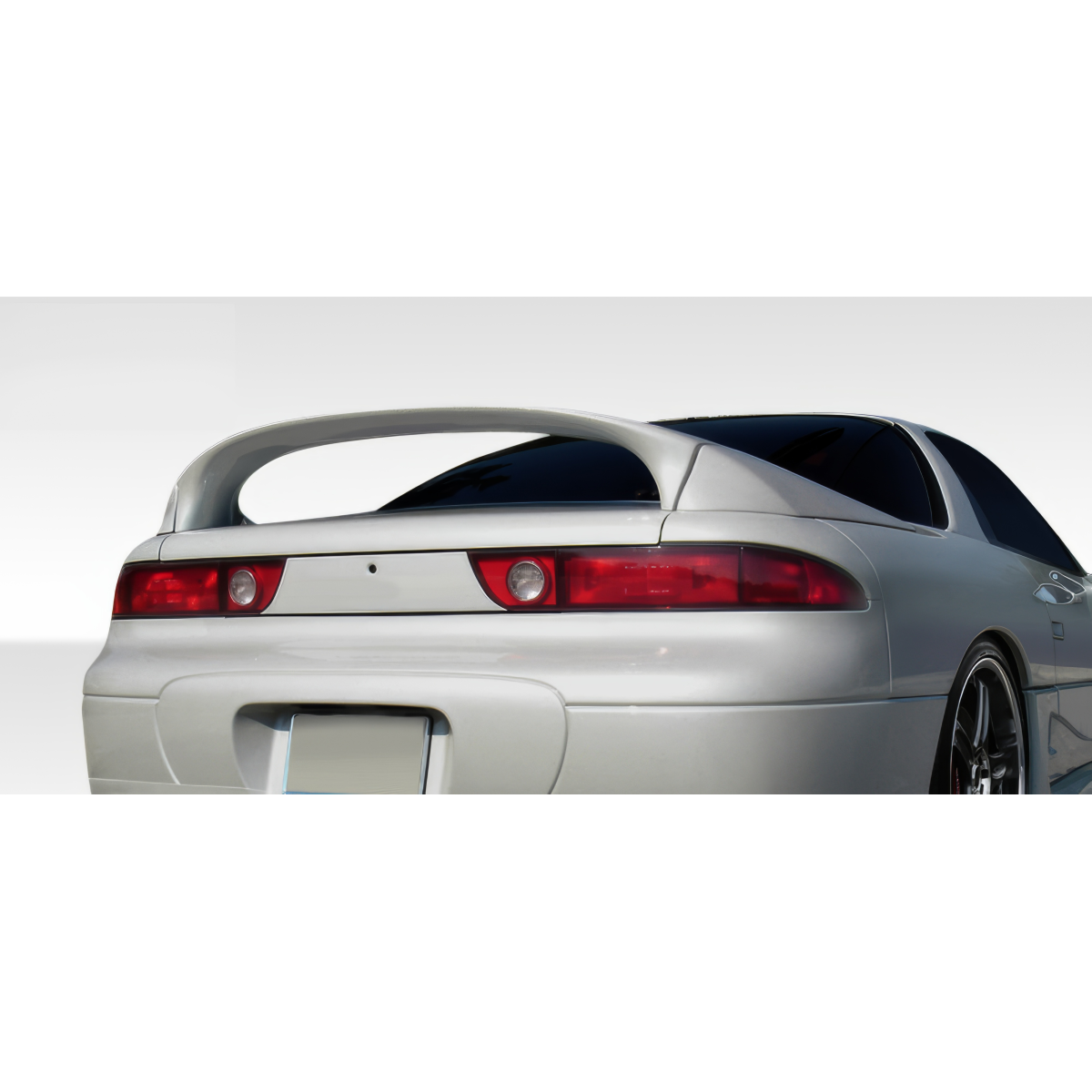 Modify your Mitsubishi 3000GT 1991 with our Exterior/Wings - Rear view angle of vehicle part showing spoiler