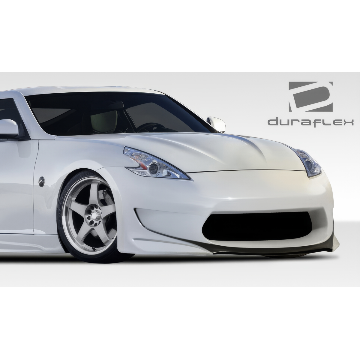 Modify your Nissan 370Z 2009 with our Exterior/Complete Body Kits - Angled view of the front bumper of the car