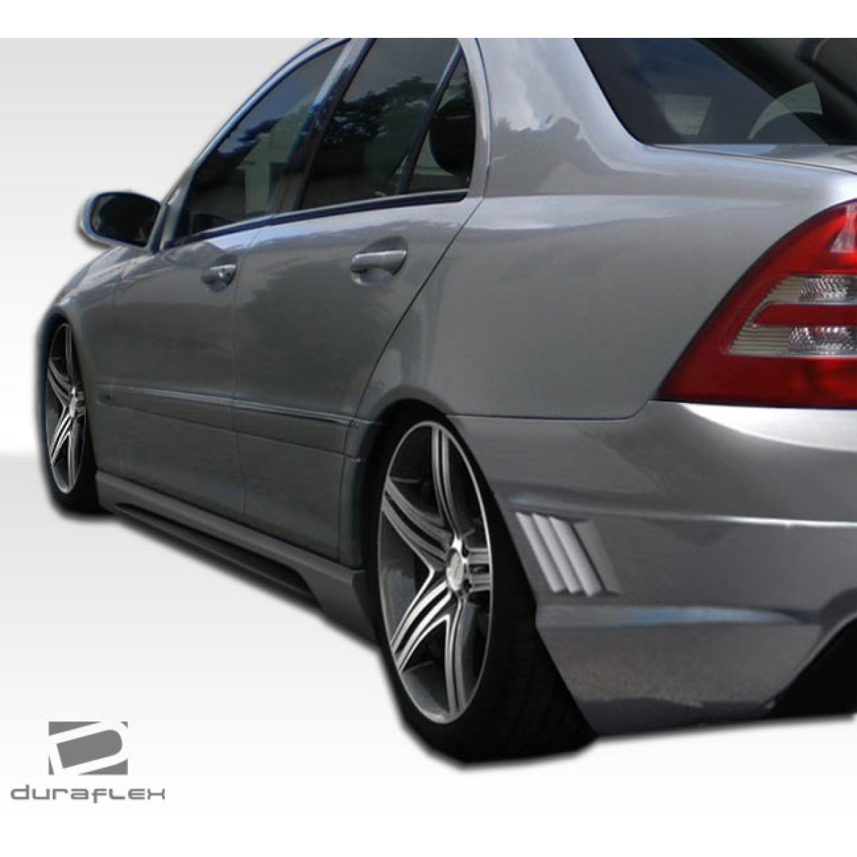 Modify your Mercedes-Benz C230 2001 with our Exterior/Complete Body Kits - Angle shows rear quarter view of the vehicle