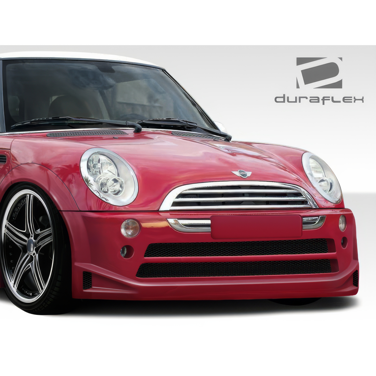 Modify your Mini Cooper 2002 with our Exterior/Front Bumpers or Lips - Front angle view of red Mini Cooper bumper