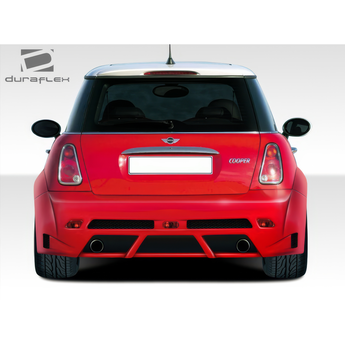 Modify your Mini Cooper 2002 with our Exterior/Rear Bumpers or Lips - Rear view angle showing Mini Cooper body design