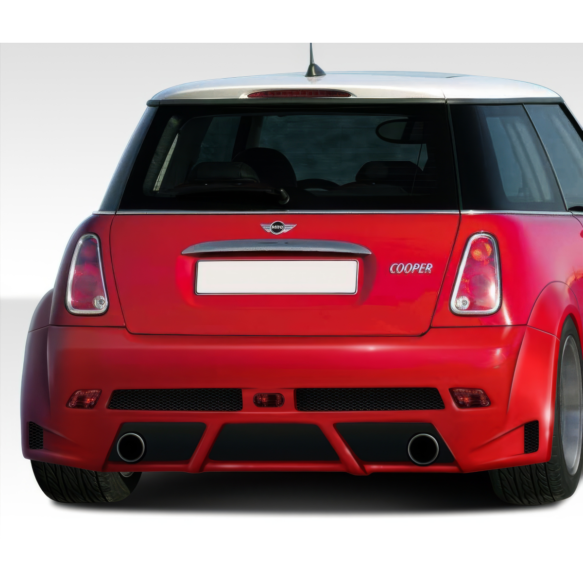 Modify your Mini Cooper 2002 with our Exterior/Rear Bumpers or Lips - Rear view at a slight upward angle