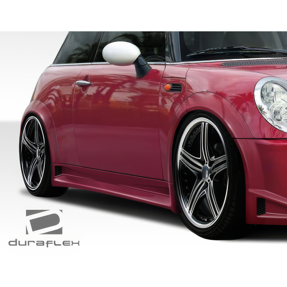 Modify your Mini Cooper 2002 with our Exterior/Fenders - Angled view of car focusing on the fender