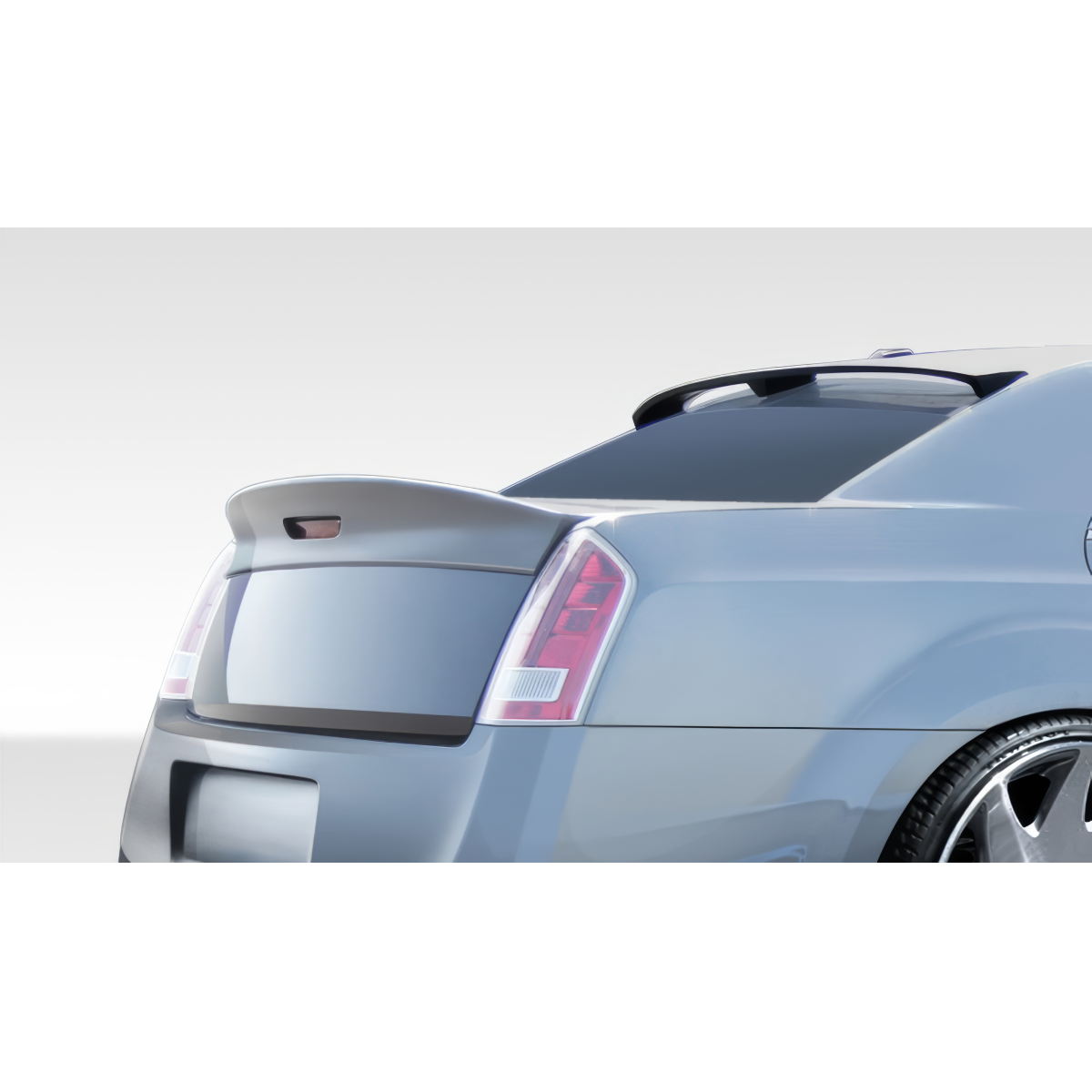 Modify your Chrysler 300 2011 with our Exterior/Complete Body Kits - Rear angle view with focus on trunk lid and wing