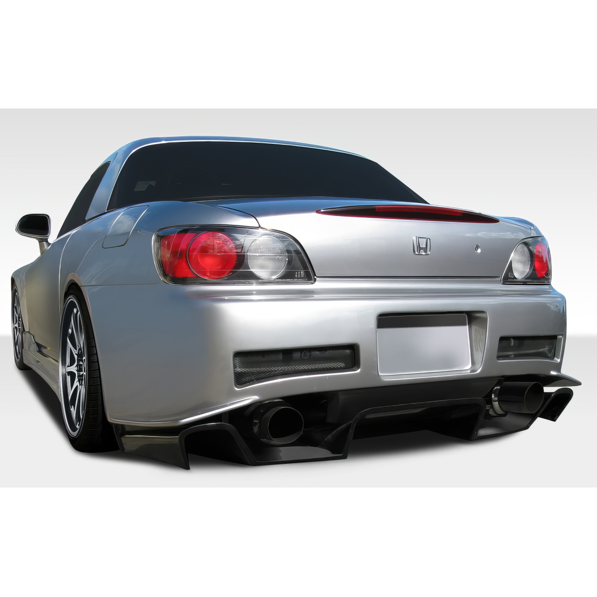 Modify your Honda S2000 2000 with our Exterior/Diffusers - Rear angle view of the car from the left side