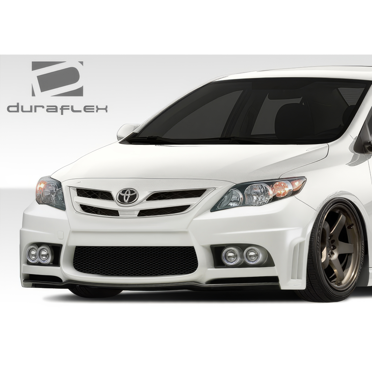 Modify your Toyota Corolla 2011 with our Exterior/Front Bumpers or Lips - Front view of vehicle at a slight angle