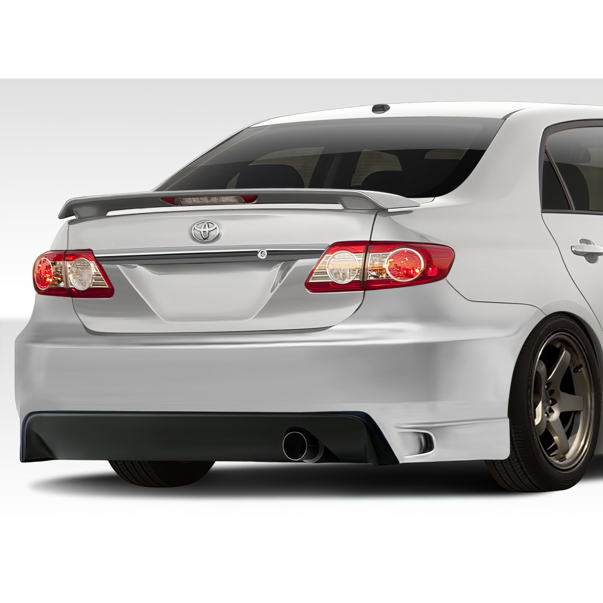 Modify your Toyota Corolla 2011 with our Exterior/Rear Bumpers or Lips - The angle shows the rear view of the car