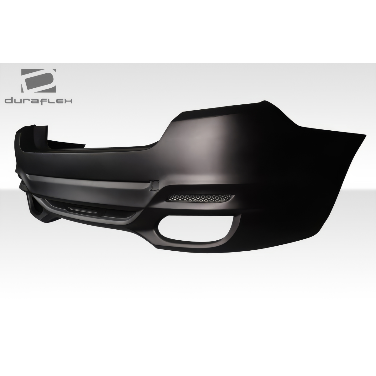 Modify your BMW 5-Series 2011 with our Exterior/Rear Bumpers or Lips - Angled view of rear bumper part showing detail