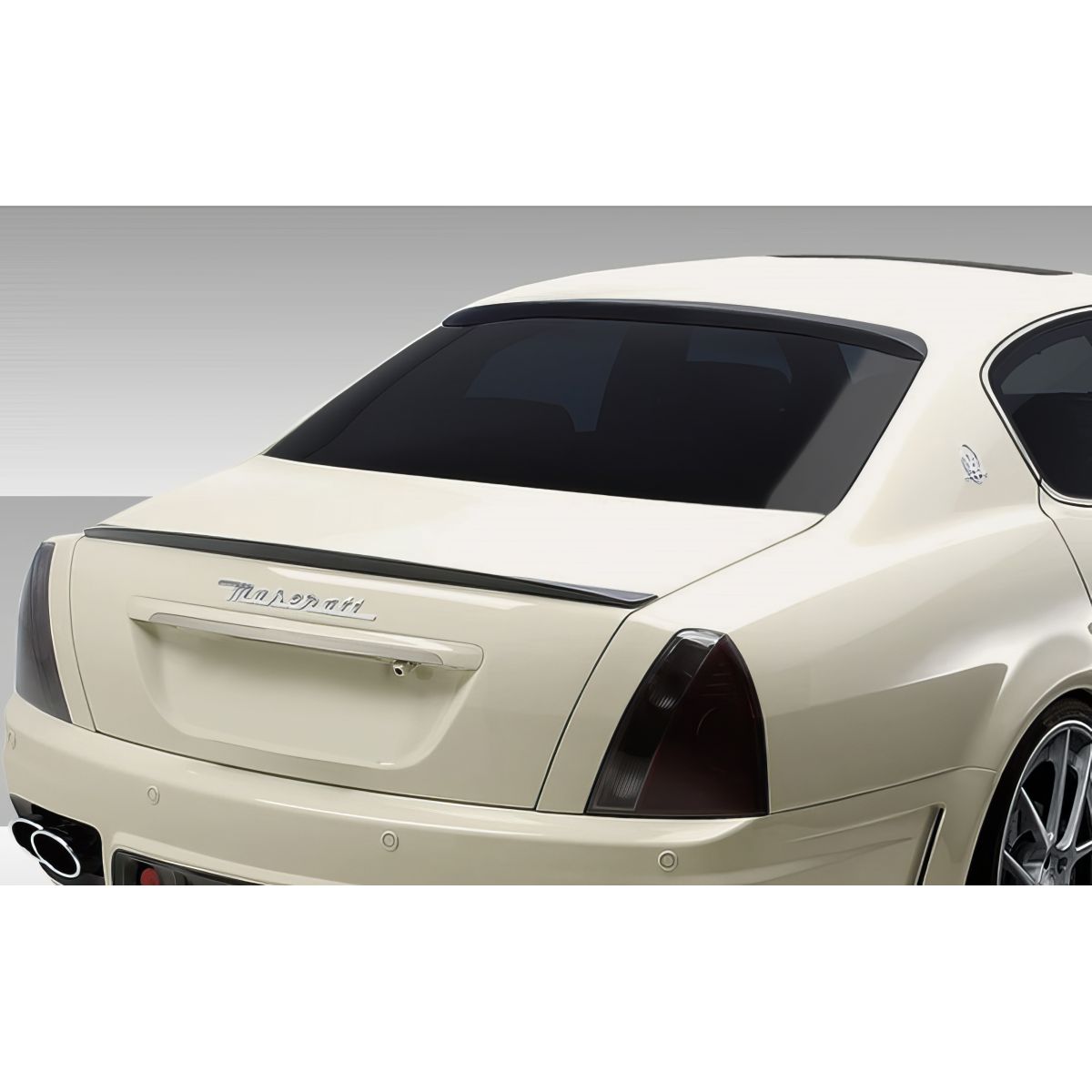 Modify your Maserati Quattroporte 2005 with our Exterior/Wings - Rear angle view of a vehicle roof wing spoiler