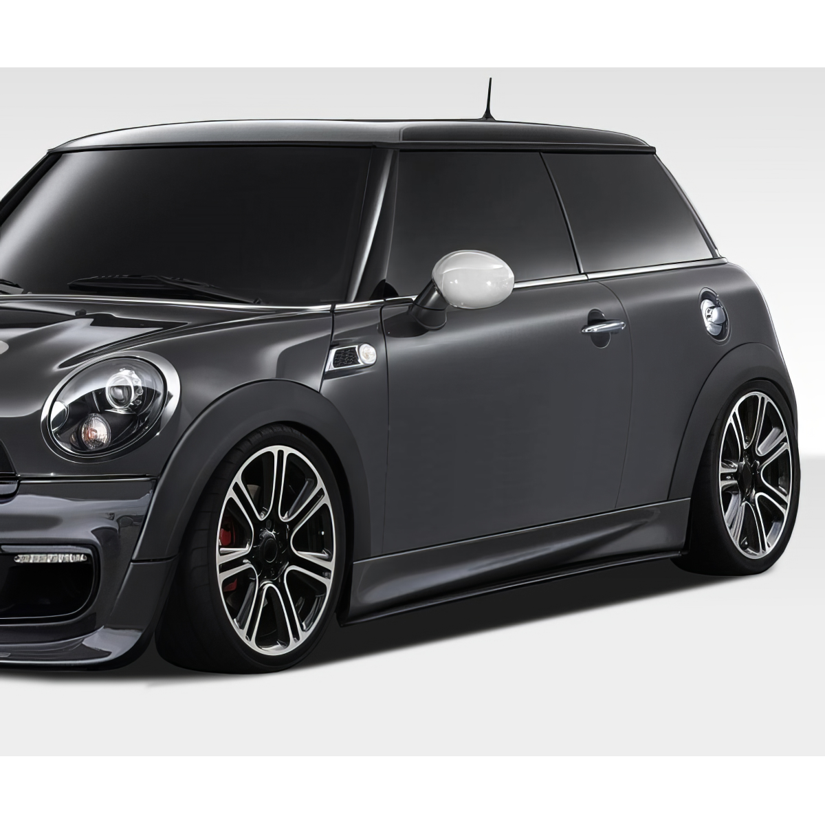 Modify your Mini Cooper 2007 with our Exterior/Other Exterior - Front quarter view of Mini Cooper with splitters