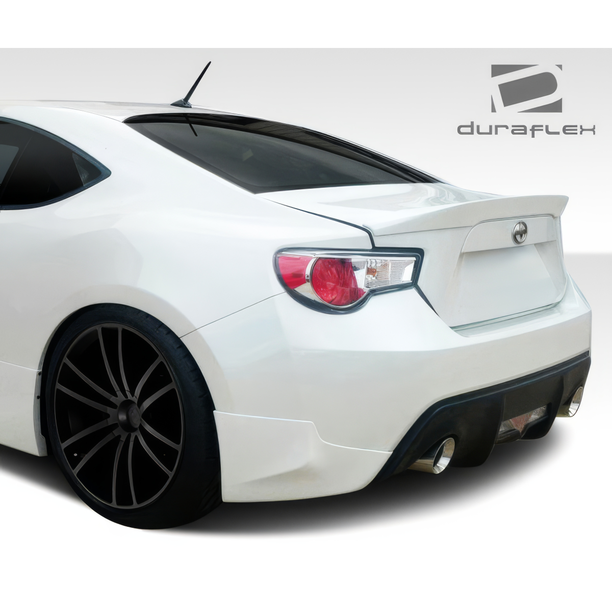 Modify your Scion FR-S 2013 with our Exterior/Complete Body Kits - Rear angle showing body kit details and wheels