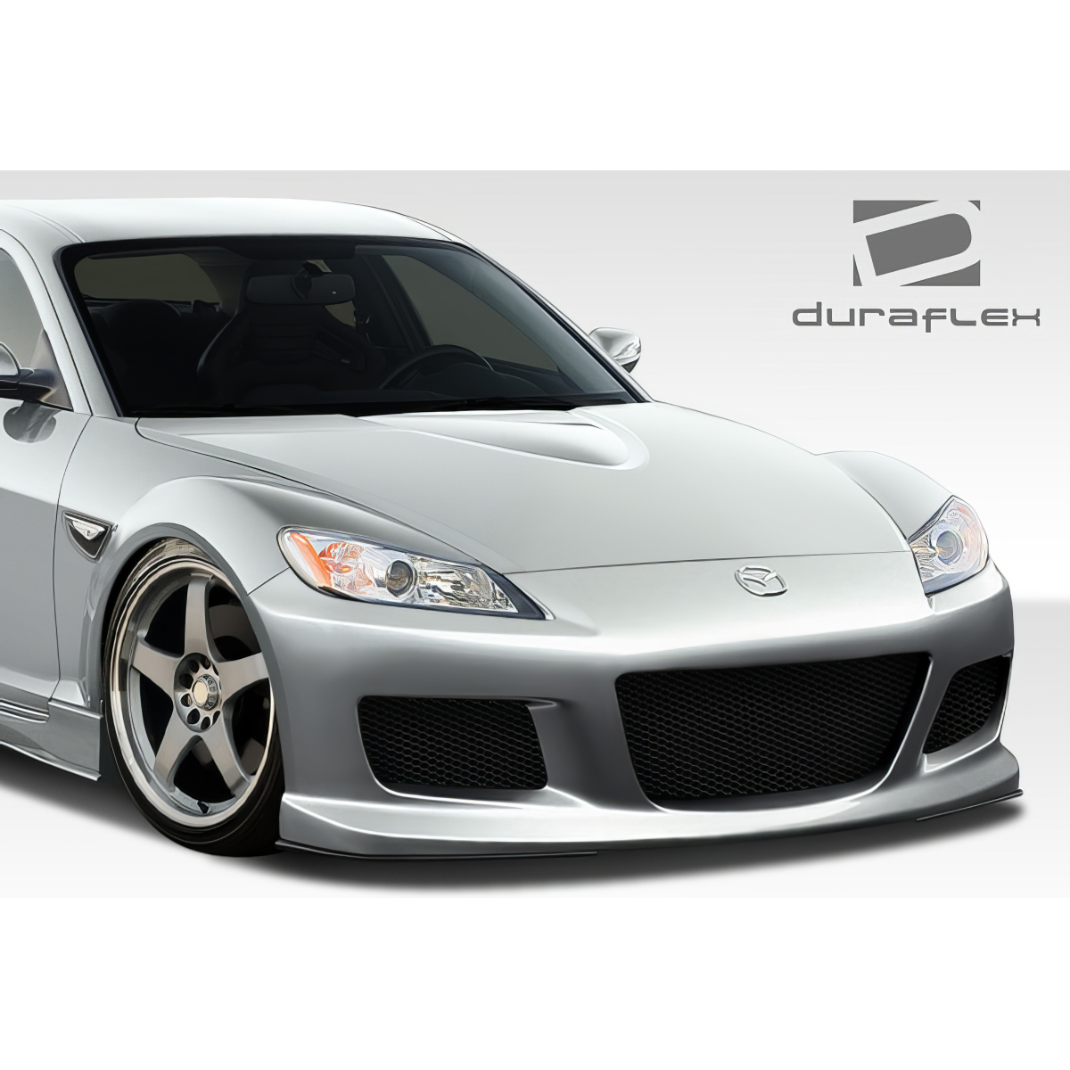Modify your Mazda RX-8 2009 with our Exterior/Front Bumpers - Front view of the car at a slight angle