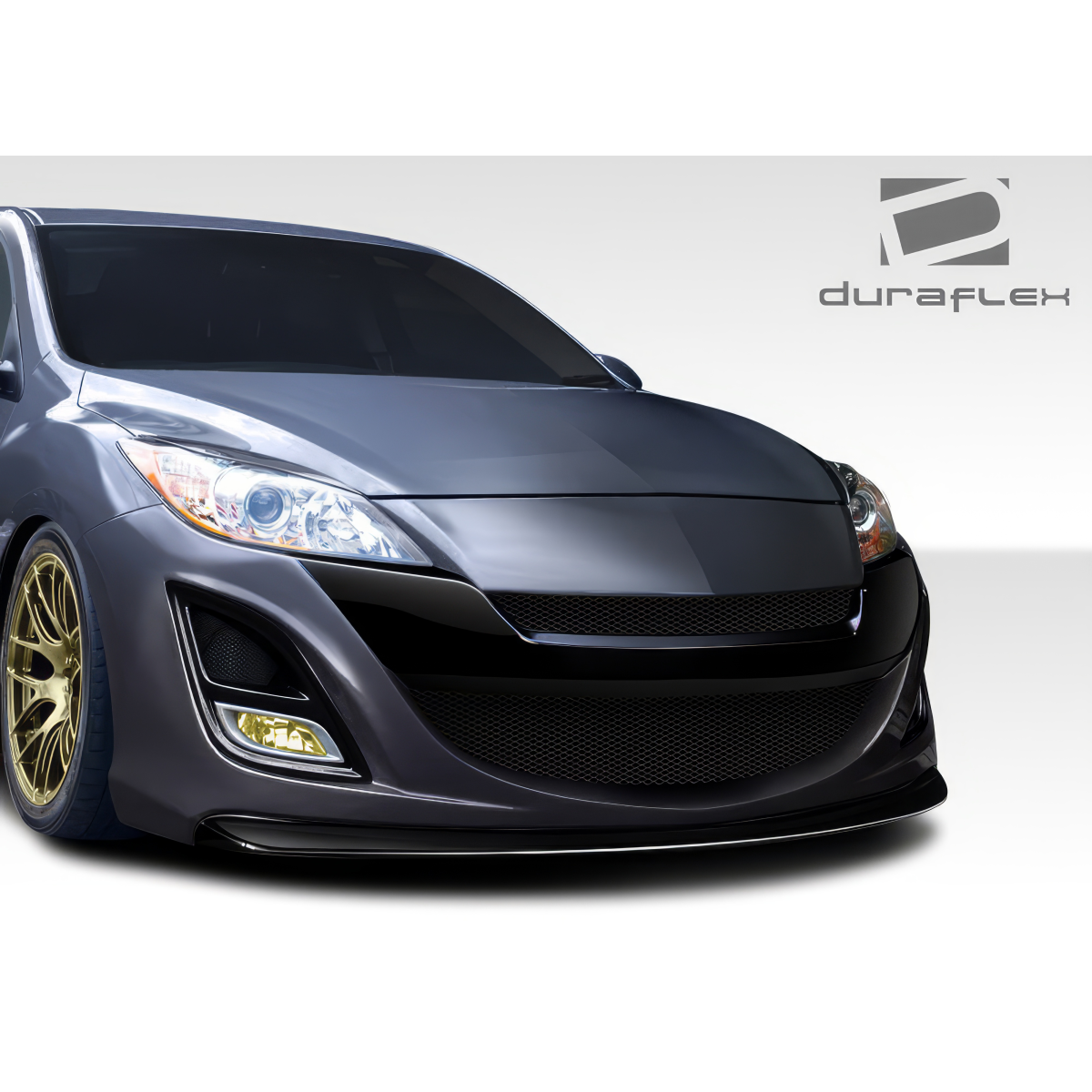 Modify your Mazda 3 2010 with our Exterior/Front Bumpers or Lips - Front angle of the vehicle viewing the bumper design
