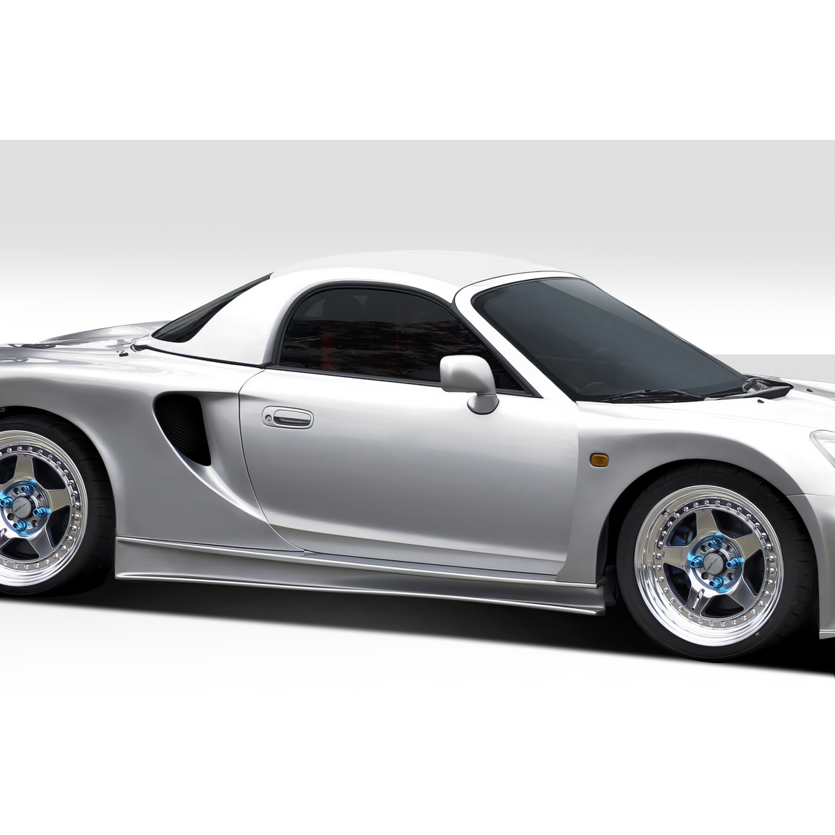 Modify your Toyota MR2 2000 with our Exterior/Complete Body Kits - Side angle view of a Toyota MR2 Spyder