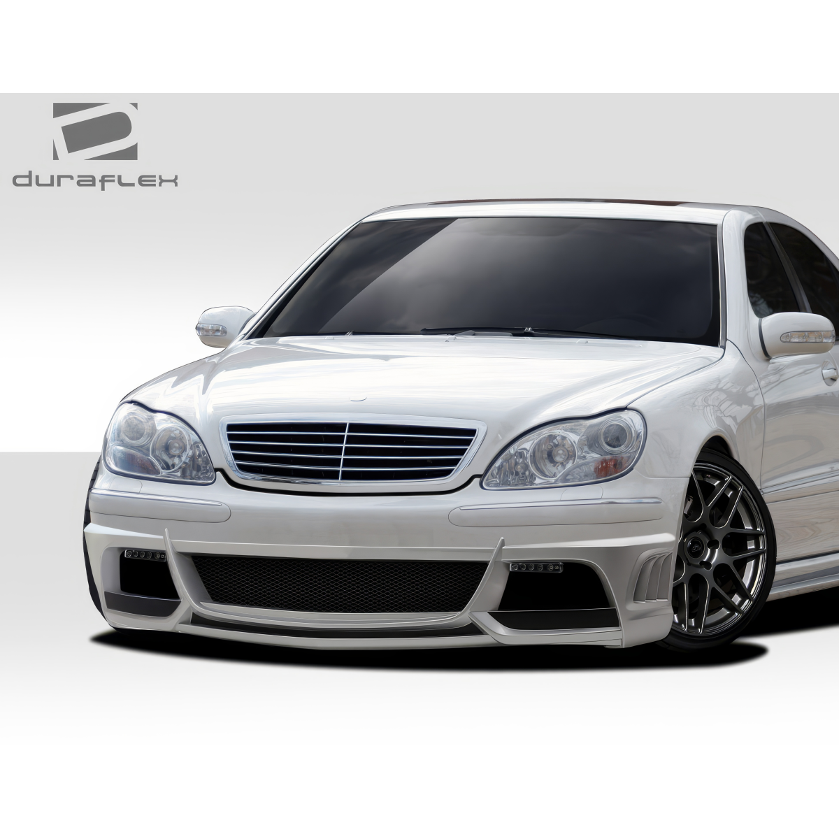 Modify your Mercedes-Benz S-Class 2000 with our Exterior/Front Bumpers or Lips - Front angle view of a white Mercedes S Class