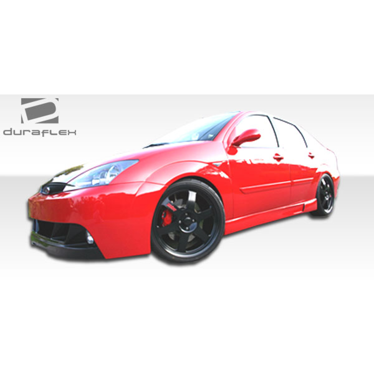 Modify your Ford Focus 2000 with our Exterior/Complete Body Kits - Front three quarter view of a red vehicle