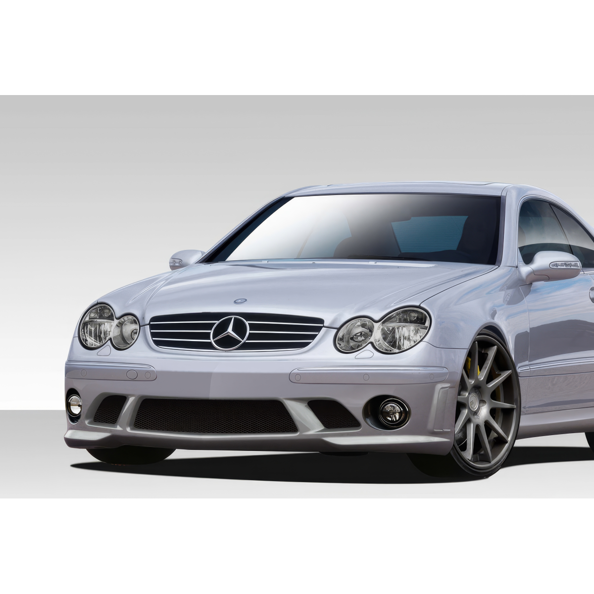 Modify your Mercedes-Benz C-Class 2003 with our Exterior/Front Bumpers or Lips - Front angle view of the vehicle