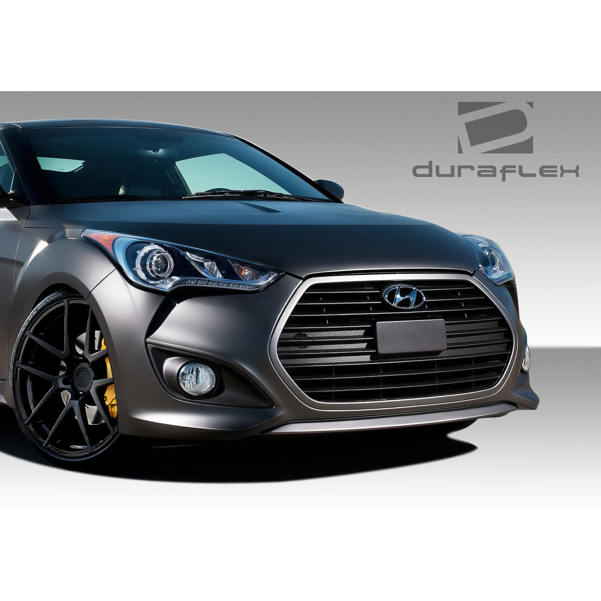 Modify your Hyundai Veloster 2012 with our Exterior/Front Bumpers or Lips - Front angle view of vehicle showcasing bumper design