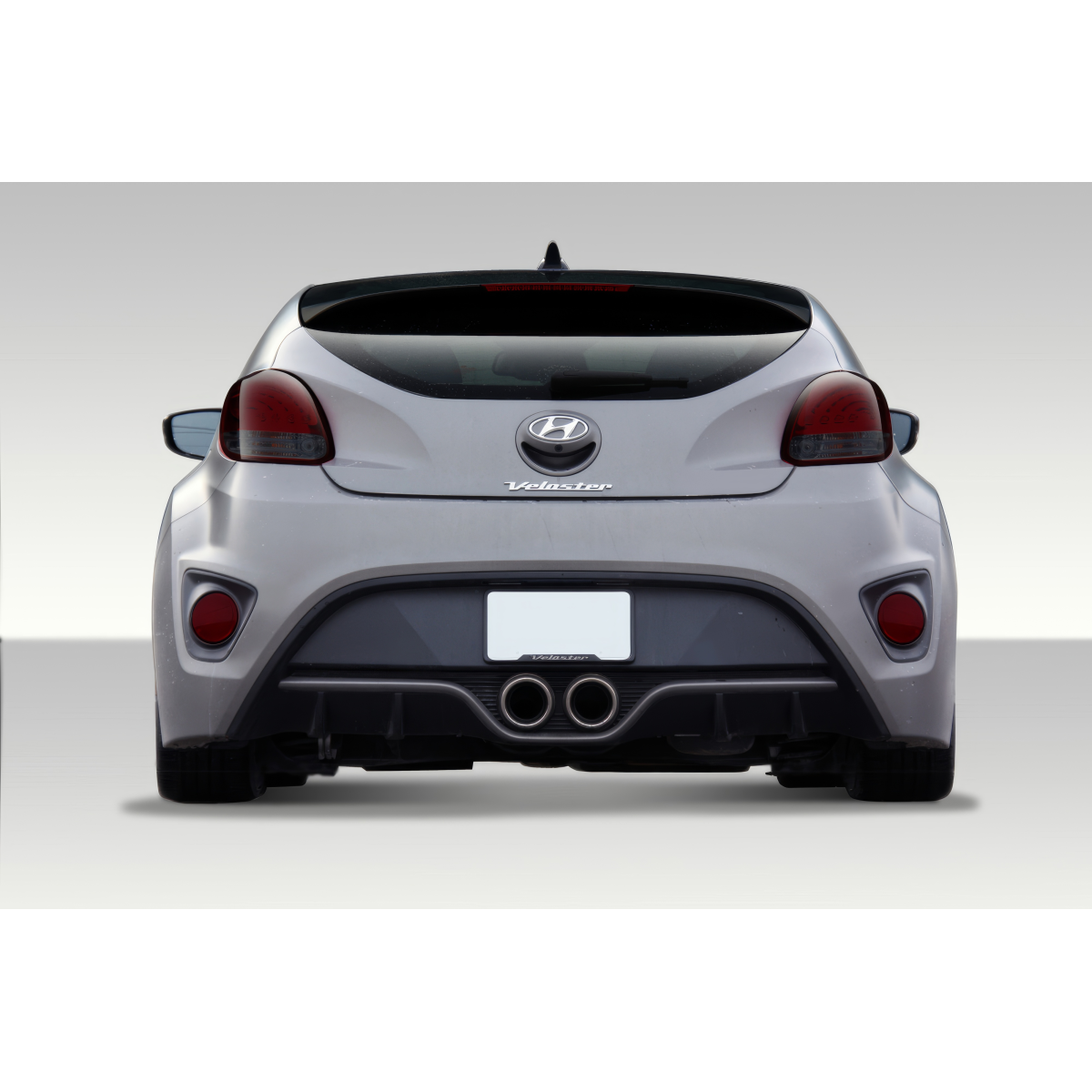 Modify your Hyundai Veloster 2012 with our Exterior/Rear Bumpers or Lips - Rear view of the vehicle from a straight angle