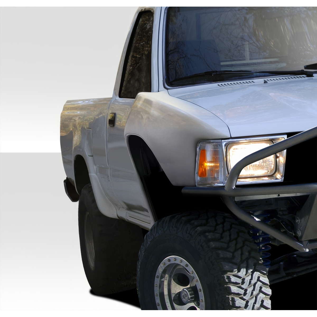 Modify your Toyota Pickup 1989 with our Exterior/Fenders - Front three quarter view of the vehicle