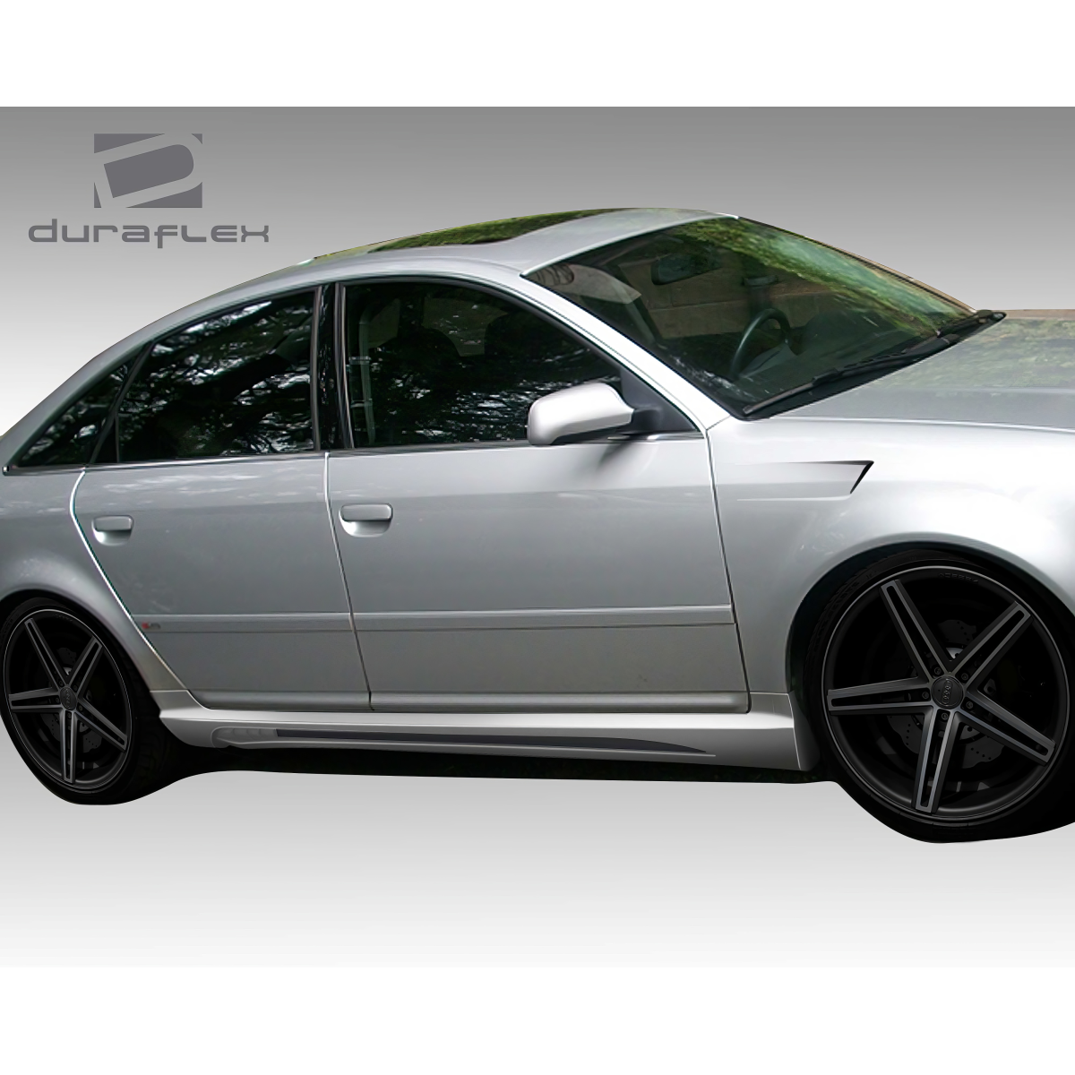 Modify your Audi A6 1998 with our Exterior/Side Skirts - Side view angle of the car showcasing side skirts