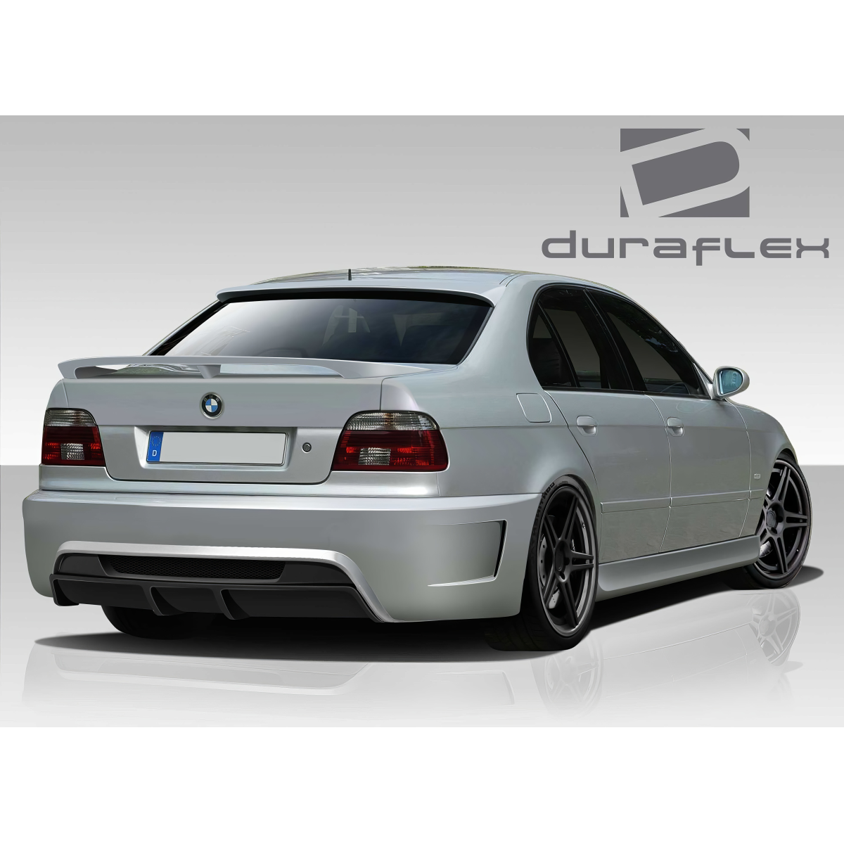 Modify your BMW 5-Series 1997 with our Exterior/Wings - Rear angle view of a BMW 5 Series E39