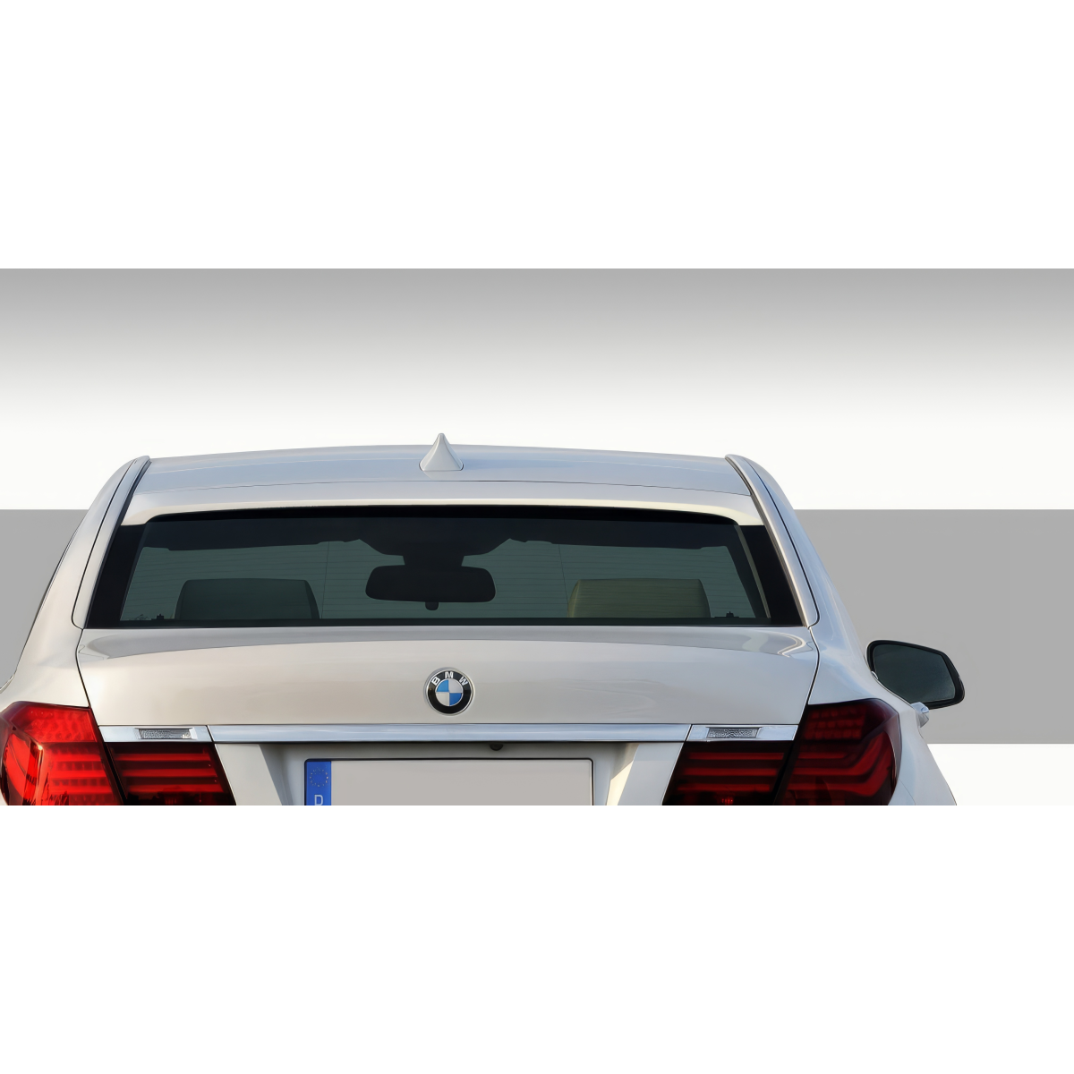 Modify your BMW 7-Series 2009 with our Exterior/Wings - Rear view angle showing the roof wing spoiler