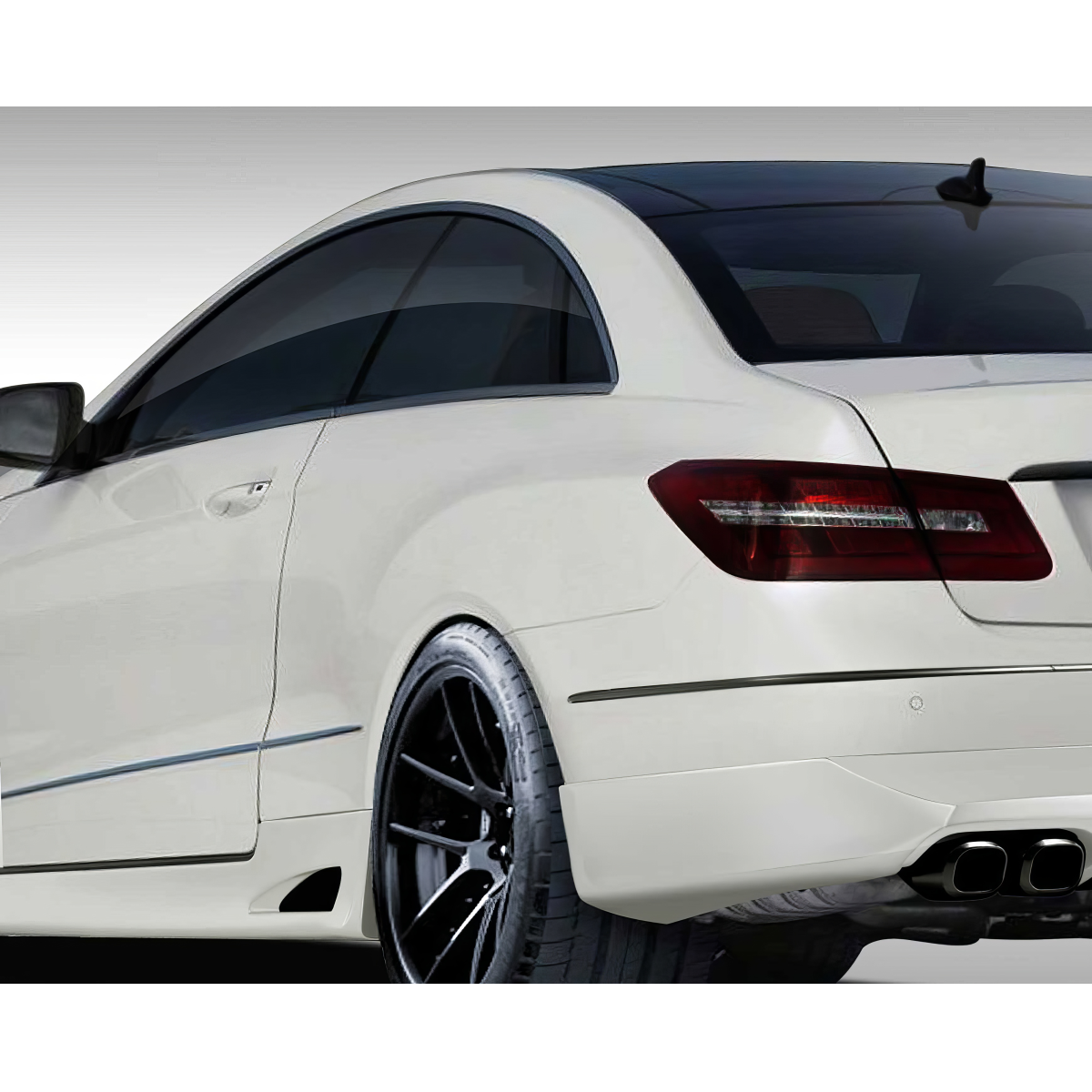 Modify your Mercedes-Benz E-Class 2010 with our Exterior/Rear Bumpers or Lips - View from rear left angle of the vehicle