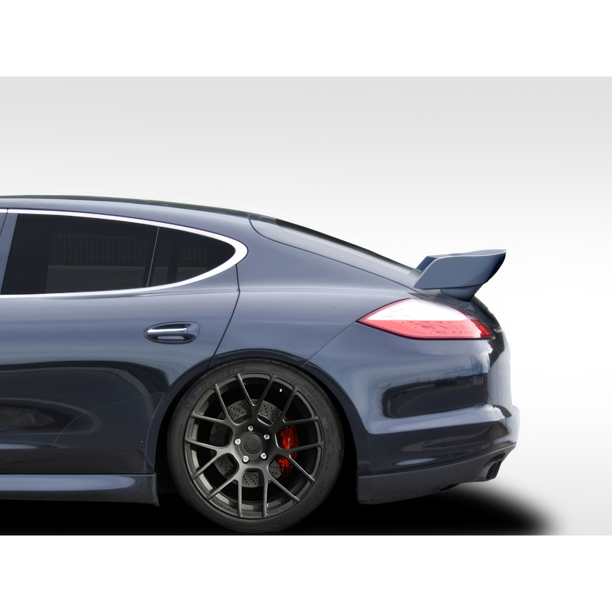 Modify your Porsche Panamera 2010 with our Exterior/Wings - Right rear angle showcasing the wing design