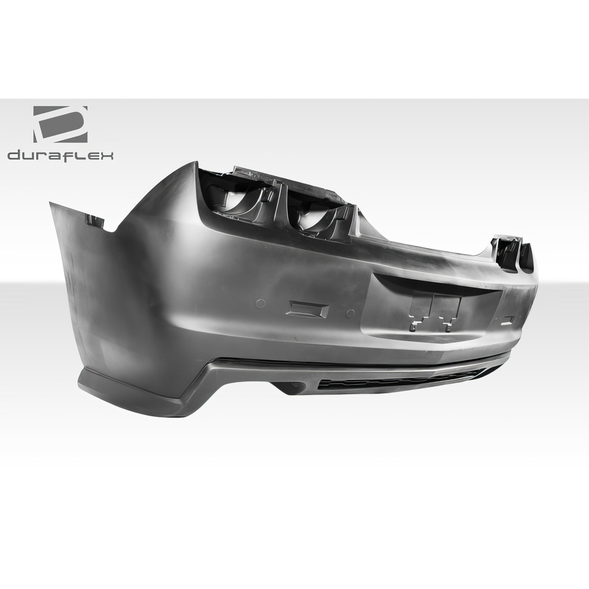 Modify your Chevrolet Camaro 2010 with our Exterior/Rear Bumpers or Lips - Part shown at a slight angle from the side