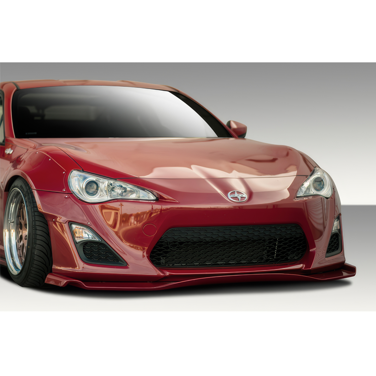 Modify your Scion FR-S 2013 with our Exterior/Complete Body Kits - Front view capturing the car design angle